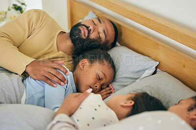 Buy stock photo Sleeping, comfort and family in bed relax, resting and dreaming in their home together. Peaceful, sleep and parents embrace children in bedroom for nap, relaxation or cozy, love and sweet on weekend