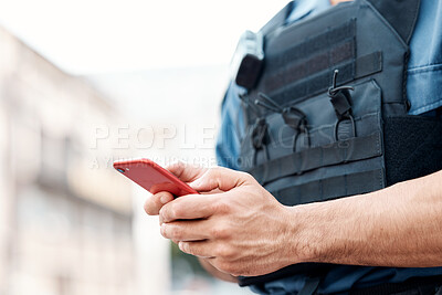 Buy stock photo Man, police and hands with phone for communication, networking or social media in the city. Closeup of male person or officer typing, texting or chatting on mobile smartphone app in an urban town