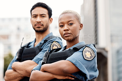Buy stock photo Police, team and arms crossed in confidence for city protection, law enforcement or crime. Portrait of confident man and woman officer standing ready for justice, security or teamwork in urban town