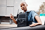 Portrait, drivers license or police officer in city to check info for law enforcement, protection or street safety. Black woman, traffic stop or cop on security patrol for road block or crime justice