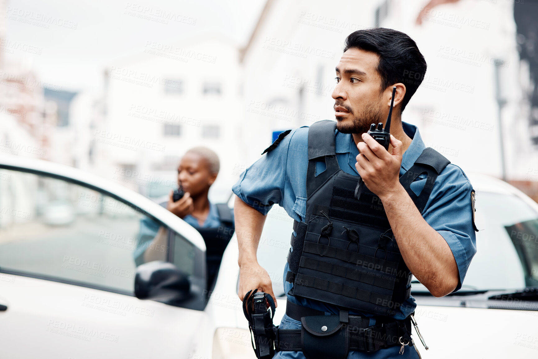 Buy stock photo Police, emergency and officer with gun calling backup for an investigation or law protection in city or urban town. Criminal, radio and legal service team or security on duty for justice enforcement