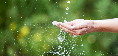 Buy stock photo Woman, hands and palm with water for natural sustainability, washing or cleanse in nature. Closeup of female person with falling liquid drops for sustainable eco friendly environment in the outdoors