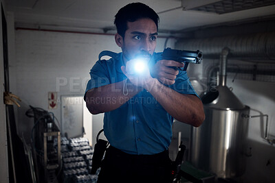 Buy stock photo Torch, security and man with gun for search, inspection and property investigation at night. Surveillance, flashlight and police male person in dark room for safety, crime watch or protection service