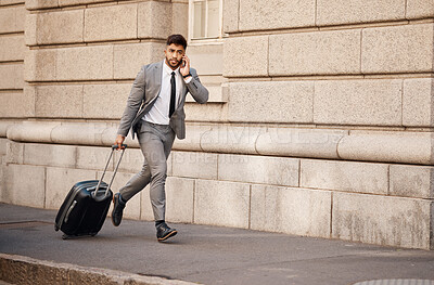 Buy stock photo Business man, running late and phone call with travel commute in city for work. Urban, road and professional person with mobile networking and stress in a street with entrepreneur and luggage