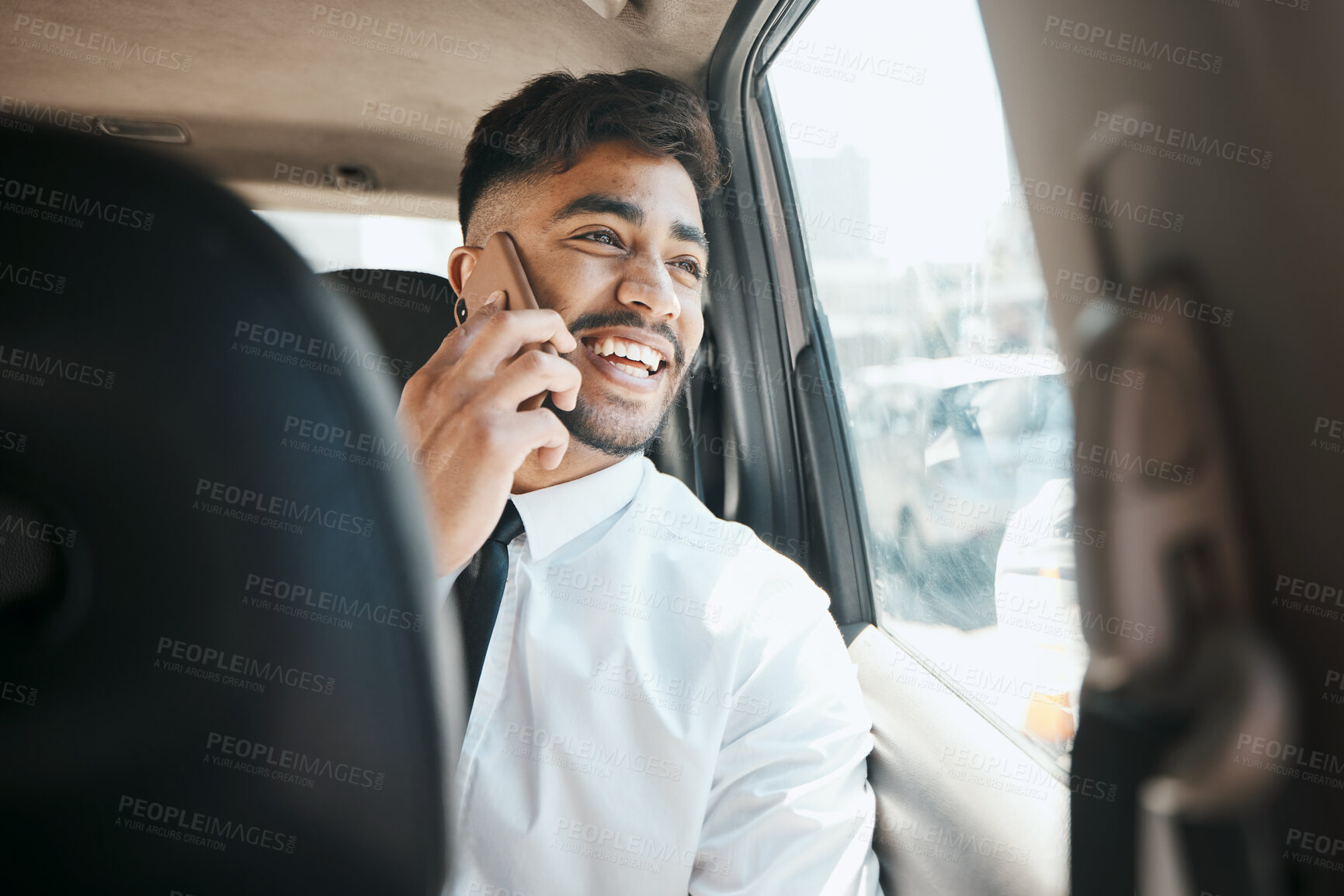Buy stock photo Happy business man, phone call and driving in car for communication, mobile networking and chat. Indian male worker, thinking and talking to smartphone contact while traveling in taxi transportation