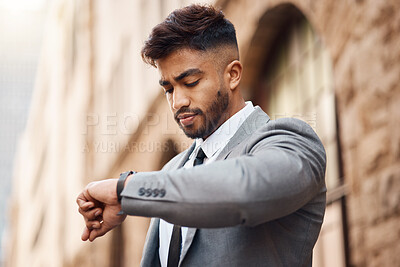 Buy stock photo Business man check watch in city for clock, schedule and waiting for appointment, taxi and travel. Indian male worker, corporate employee and wristwatch for time management on urban commute outdoor