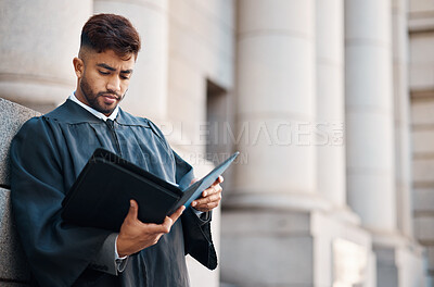 Buy stock photo Lawyer man, street and reading documents for case, court battle by city building with information for criminal defence. Young attorney, paperwork and study for litigation, evidence and justice system