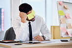 Tax, problem and business man with sticky note in office for debt, audit or financial crisis on computer. Stress, tired or professional with burnout for mistake, fail or bankruptcy, bills or reminder