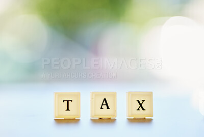 Buy stock photo Tax, word or message on wood blocks or letters writing on financial, report or management of money on a bokeh background space. Accounting mockup, planning for finance or taxes on audit in the future