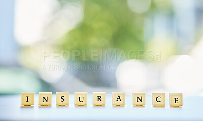 Buy stock photo Wood blocks, insurance and words on table, writing or letters with mockup. Security, guarantee and cubes with text for healthcare, safety and medical emergency, accident and future planning in life