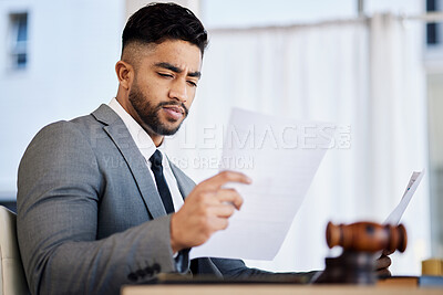 Buy stock photo Work, reading and a lawyer with a document in an office for business, justice and a legal contract. Serious, desk and a corporate advocate with paperwork or a report on a case or review of a proposal