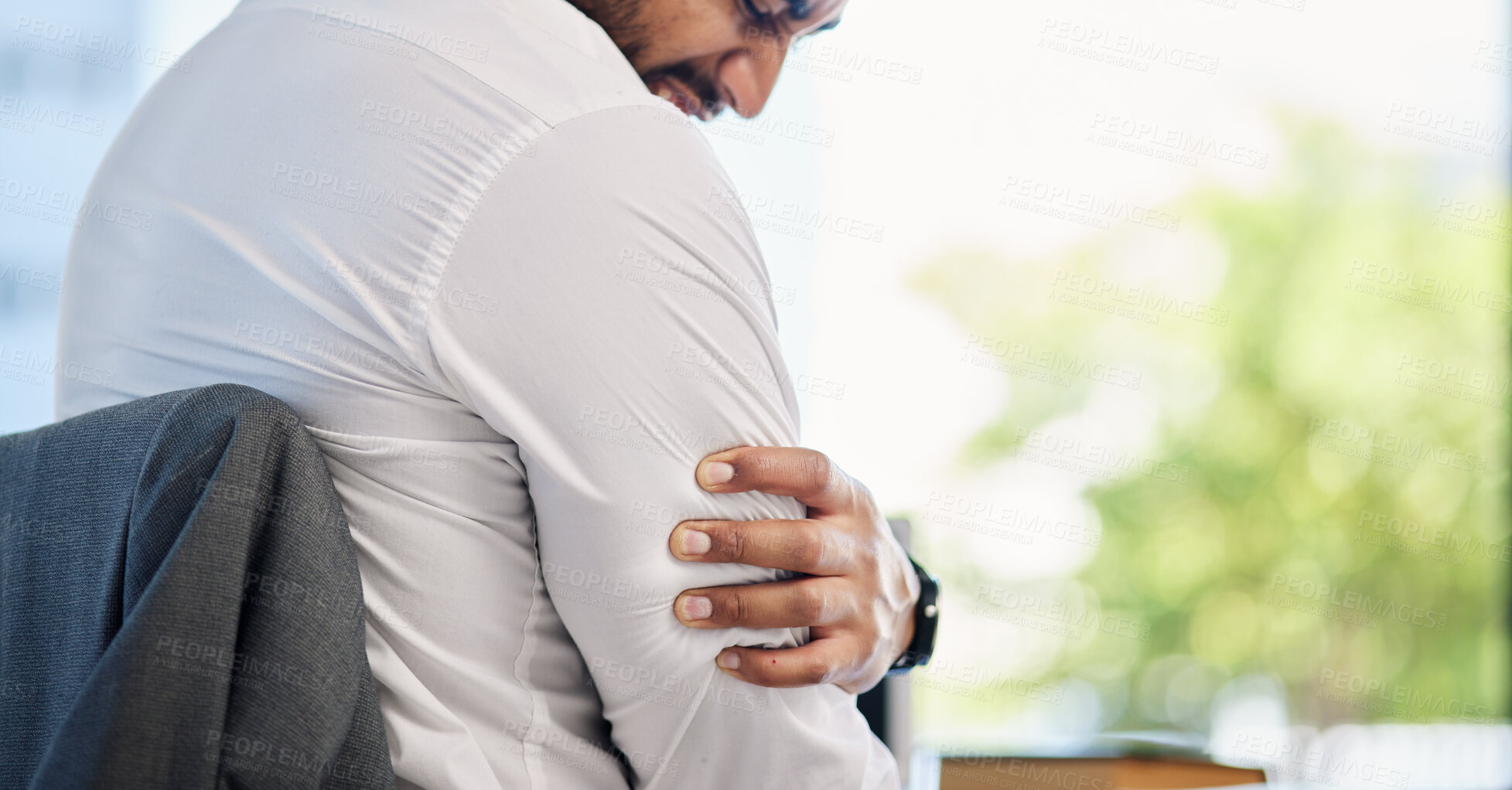 Buy stock photo Businessman, pain in arm or injury to muscle from accident, stress or strain in the office, workplace or medical emergency at work. Man, sore arms or strain on muscles from working or activity