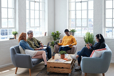 Buy stock photo Creative, discussion and business people in the office lounge or coworking space planning project in collaboration. Teamwork, diversity and team working together with technology on sofa in workplace.