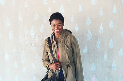 Buy stock photo Portrait, education and smile with a black woman student against rain wallpaper on the campus of her university. Study, scholarship and academic with a happy young female pupil learning at college