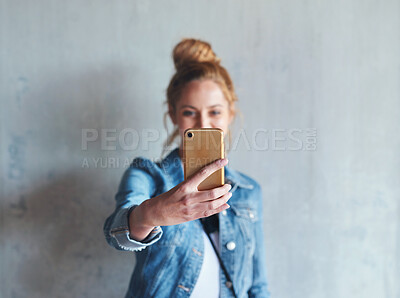 Buy stock photo Selfie, influencer and woman on social media with phone in hand, smile and wall background. Happy face of young content creator, digital photography and girl streaming video with online mobile app.