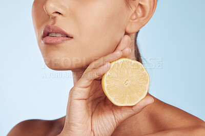 Buy stock photo Woman, orange and natural beauty, skincare and eco friendly product isolated on blue background. Citrus fruit in hand, vitamin c and female model, sustainability in dermatology and closeup in studio