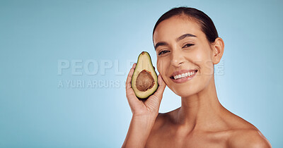 Buy stock photo Woman, avocado and portrait, natural beauty and skincare with eco friendly product isolated on blue background. Mockup space, happy female model and banner, fruit and sustainability in dermatology