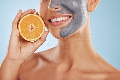 Buy stock photo Fruit, face mask and woman with orange for vitamin c, skincare or organic treatment isolated in blue studio background. Citrus, skin and young female person with facial wellness, nutrition and detox