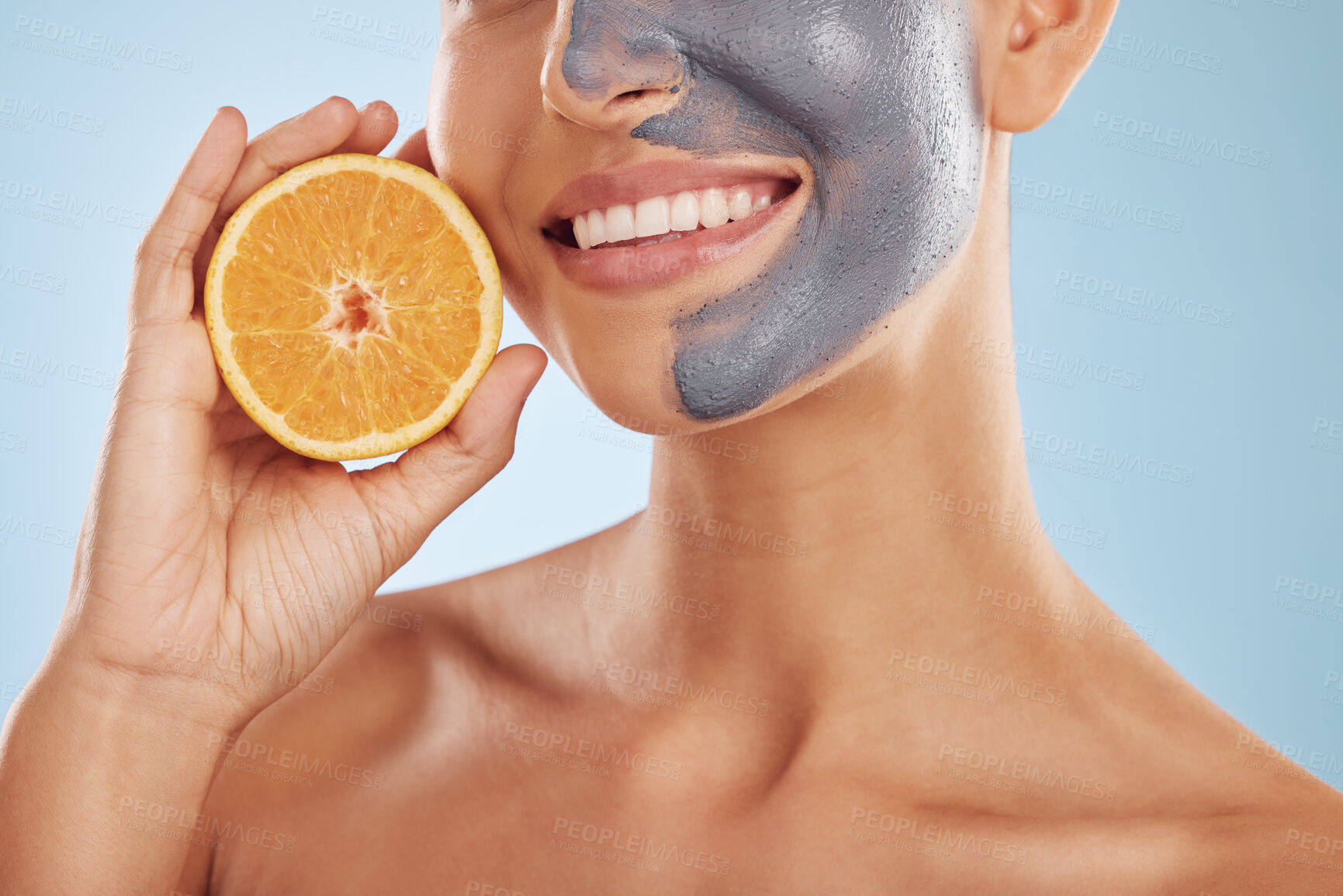 Buy stock photo Fruit, face mask and woman with orange for vitamin c, skincare or organic treatment isolated in blue studio background. Citrus, skin and young female person with facial wellness, nutrition and detox