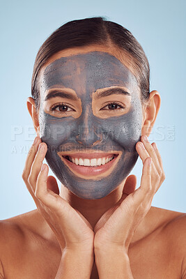 Buy stock photo Woman, face mask and charcoal for beauty, skincare and natural cosmetics cleaning product on studio, blue background. Portrait of person or model in facial collagen and mud skin care for dermatology