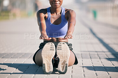 Buy stock photo Sports woman, legs and stretching to touch feet for fitness, training and performance on urban ground. Shoes, female athlete and warm up for workout, muscle mobility and flexible exercise of runner