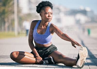 Buy stock photo Fitness, thinking and stretching with a black woman runner outdoor for healthy cardio or body endurance while training. Exercise, idea or warm up with a young athlete getting ready to workout