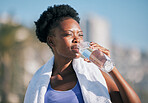 Drinking water, fitness and woman in city for training, exercise and workout nutrition, health or wellness outdoor. Tired runner or athlete person with liquid bottle for nutrition, energy and cardio