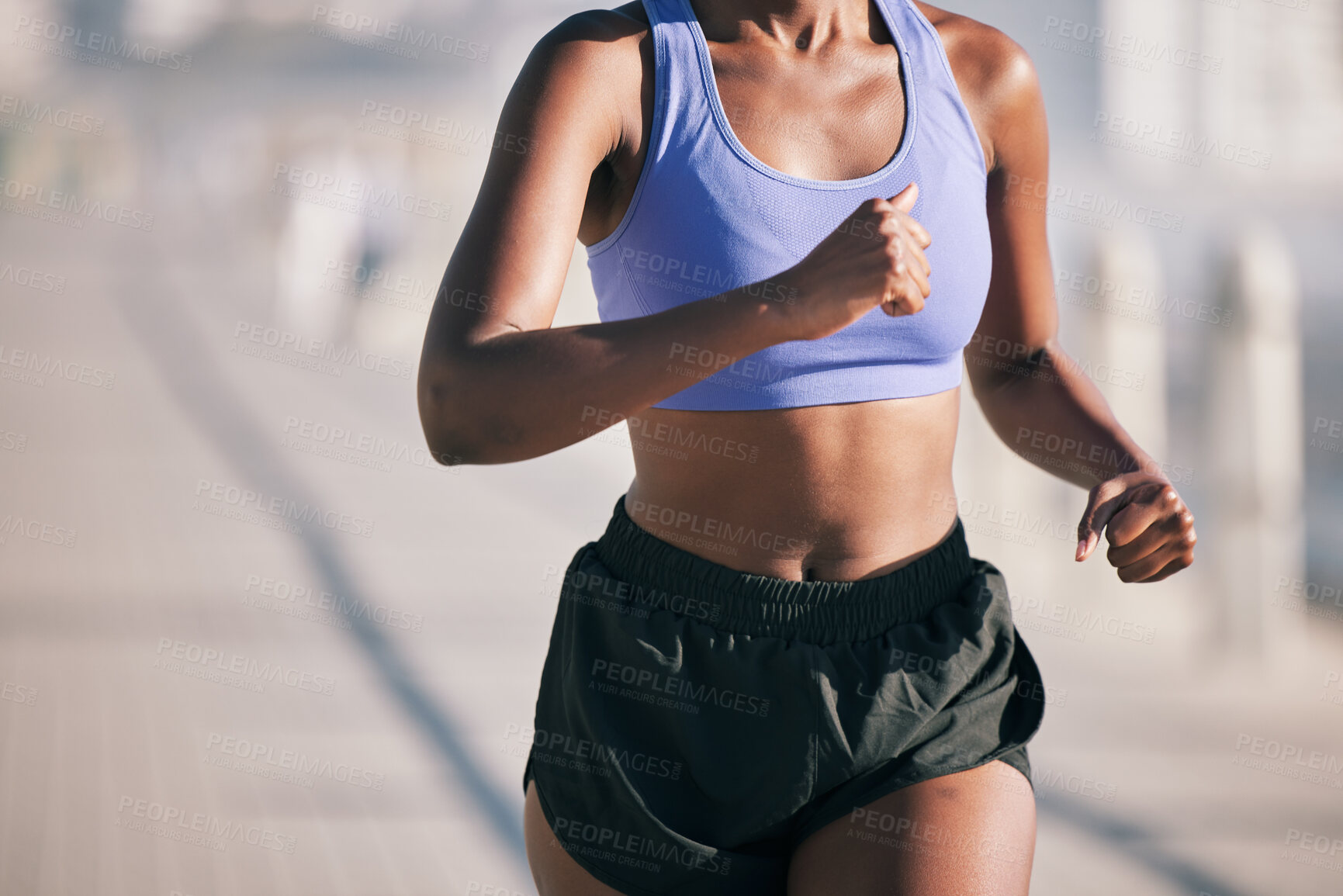 Buy stock photo Closeup, woman and body running outdoor in sun for marathon race, sports performance and fitness. Female runner, cardio training and healthy summer workout for energy, fast action and urban exercise 