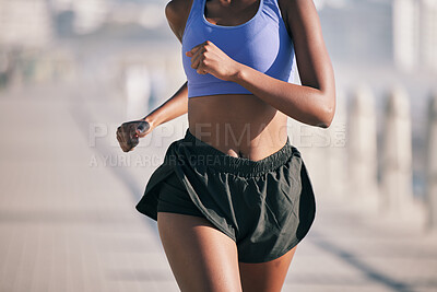 Buy stock photo Closeup, sports woman and running motion in sunshine for marathon race, performance and fitness. Female runner, cardio training and summer workout for energy, fast action and power of urban exercise