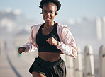 Portrait, running and black woman outdoor with earphones for audio, radio music and podcast. Sports, fitness and happy African athlete training, workout and exercise for health, wellness and cardio