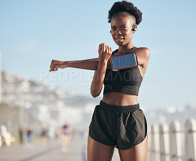 Buy stock photo Portrait, music and stretching with a sports black woman outdoor on a blurred background for cardio or endurance training. Exercise, health or phone with a young runner getting ready for a workout