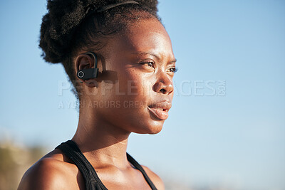 Buy stock photo Black woman, runner and thinking with headphones, outdoor and vision for fitness, health and music. African girl, running and listening with audio tech, streaming subscription or mindset for exercise