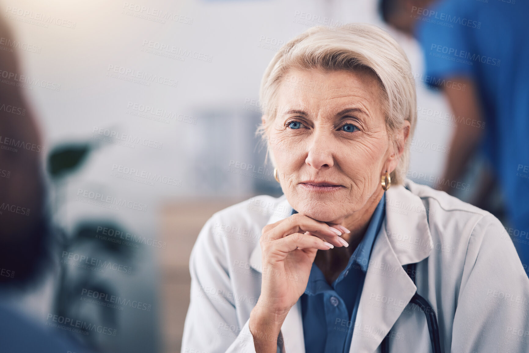 Buy stock photo Face of mature woman, doctor and listening in consultation for healthcare support, communication and clinic services. Serious medical therapist consulting patient in hospital for feedback in surgery