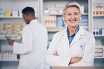 Woman, portrait and pharmacist smile with arms crossed for medical services, medicine advice and healthcare support. Mature female manager working with pride in retail drugstore, pharmacy and shop 