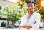 Smile, business and arms crossed with portrait of black woman in city for pride, confidence or entrepreneur. Creative, manager and urban with face of person in outdoors for expert, mission and career