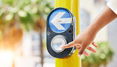 Buy stock photo Crosswalk, arrow and button with hand of woman in city for traffic light, intersection and safety. Travel, sign and stop with person at pedestrian crossing in street for press, transport and warning