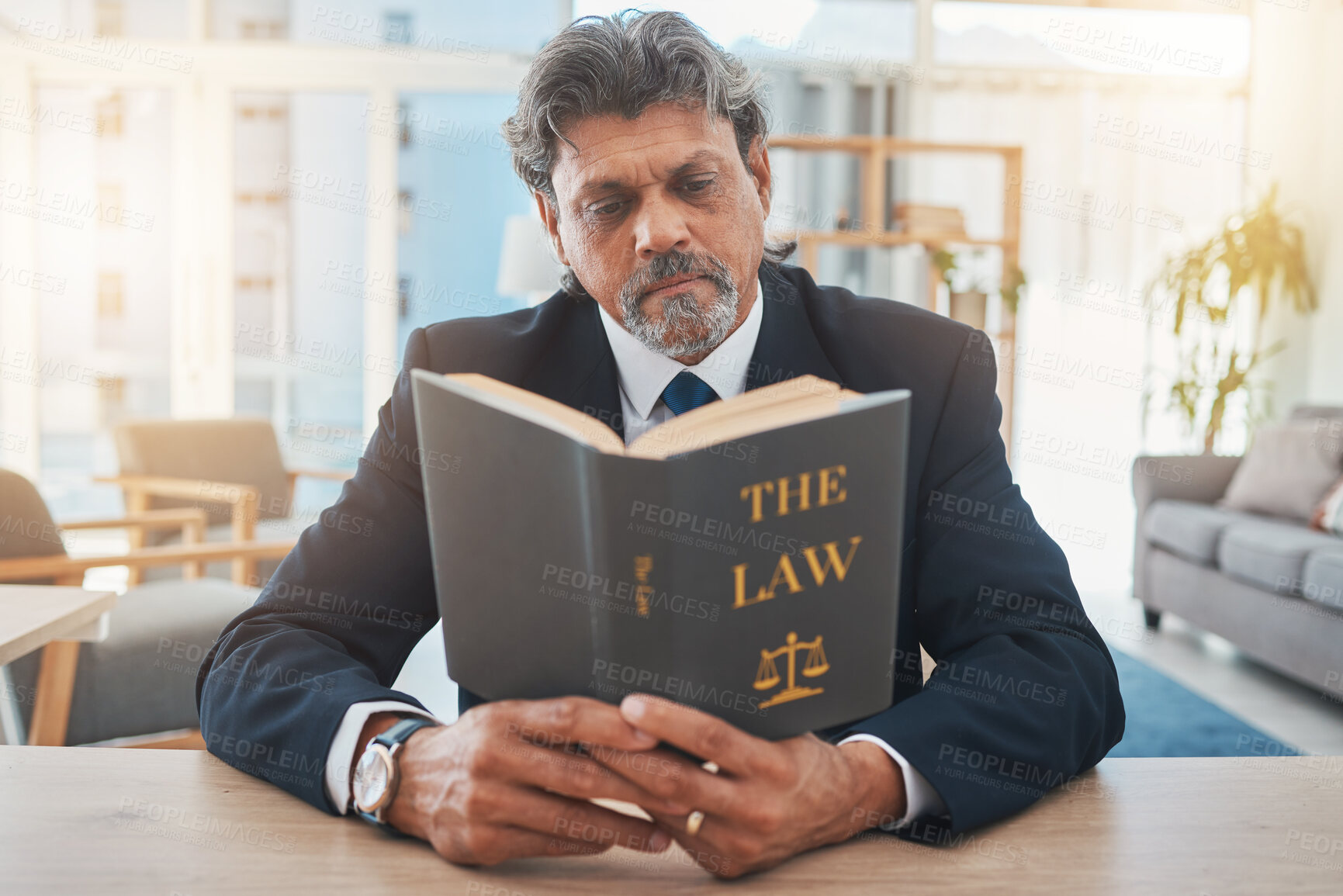 Buy stock photo Lawyer, man and reading book in office for legal information, knowledge and business research, compliance or rules. Textbook, judge and professional person, professor or senior attorney with justice