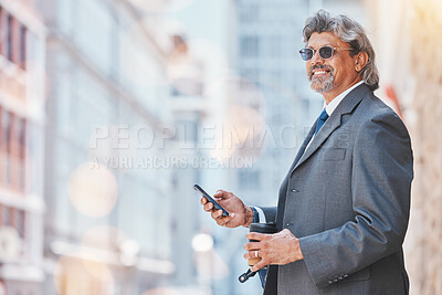 Buy stock photo Senior, business man and smartphone in city, travel and commute, bokeh and communication outdoor. Mexican male executive, CEO using phone on journey to work and urban street with mockup space