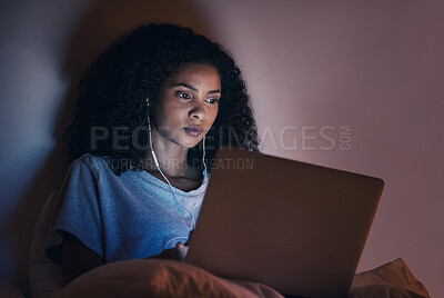 Buy stock photo Laptop, bedroom and woman with music at night for radio, podcast sound and online social media in home. Bed, computer and person with earphones streaming movie, film and video on tech with insomnia