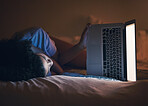 Laptop, bed and woman on internet at night for website, online social media and relax in home. Bedroom, computer and person streaming movie, film and video on pc technology with insomnia in house.