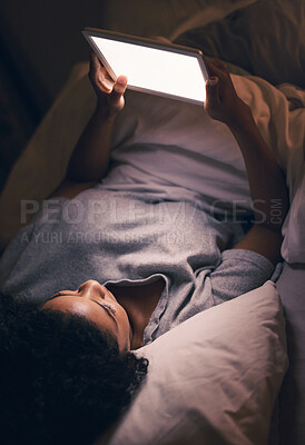 Buy stock photo Woman, tablet and bed in night with reading, blank screen and search for video, chat or social media app. Girl, digital touchscreen and mockup space with empty ux, scroll or watch movie in dark home