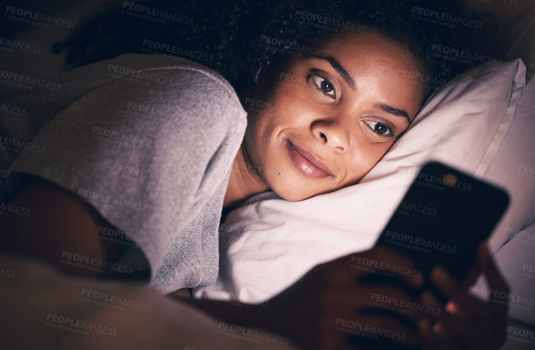 Buy stock photo Happy, night and phone with woman in bedroom for social media app, insomnia and networking. Communication, contact and internet with female person in bed at home for mobile, online and technology