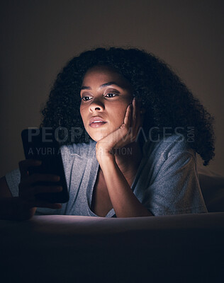 Buy stock photo Focus, night and phone with woman in bedroom for social media app, insomnia and networking. Communication, contact and internet with female person in bed at home for mobile, online and technology