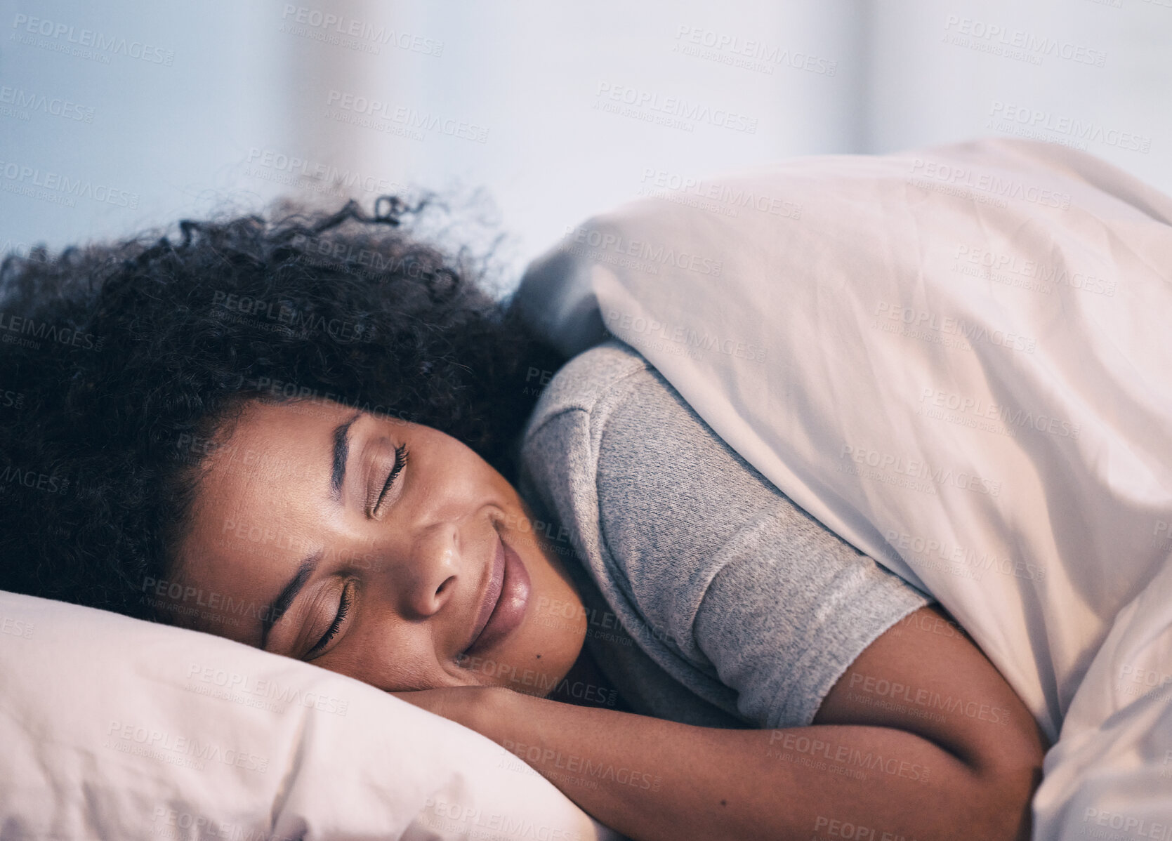 Buy stock photo Sleeping, woman and smile in bed with morning nap at home with rest feeling calm with peace. House, bedroom and tired female person relax and comfortable on a pillow with blanket dreaming on weekend