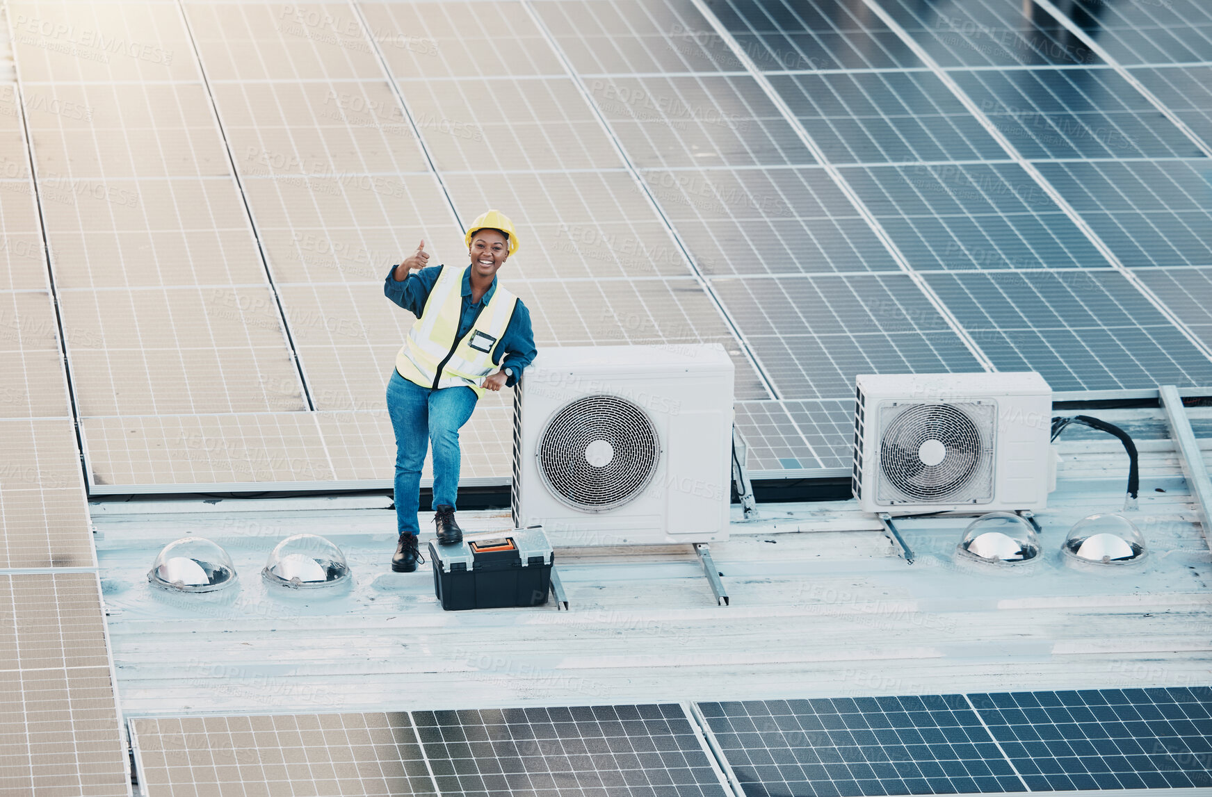 Buy stock photo Engineer woman, solar panel and thumbs up with smile for clean power, sustainability or success on roof. Technician, photovoltaic technology and happy with goal, winner and sign with electricity grid