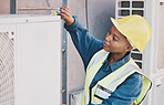 Black woman, technician and building installation for solar panel, construction or vent on roof. African female person, contractor or engineer installing industrial equipment for architecture in city