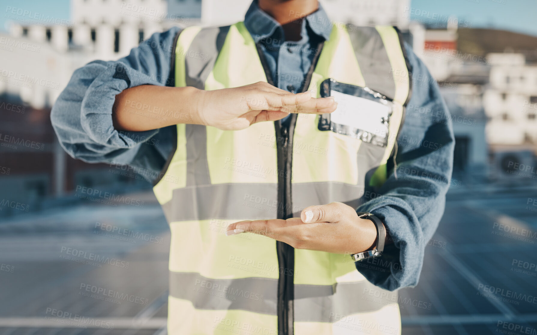 Buy stock photo Hands, construction and engineer on a roof for solar energy, building electric plant or electricity advertising. Sustainable marketing, gesture and a worker for electrician innovation and maintenance