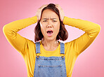 Wow, shock and portrait of woman in studio, confused face with doubt and fear on pink background. Surprised facial expression, frustrated gesture and anger emoji for asian girl in casual fashion.