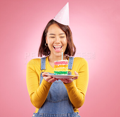 Buy stock photo Birthday cake candle, celebration and Asian woman excited, smile and celebrate party, surprise or studio gift. Event cheers, wow and Japanese person with dessert, candy or sweets on pink background