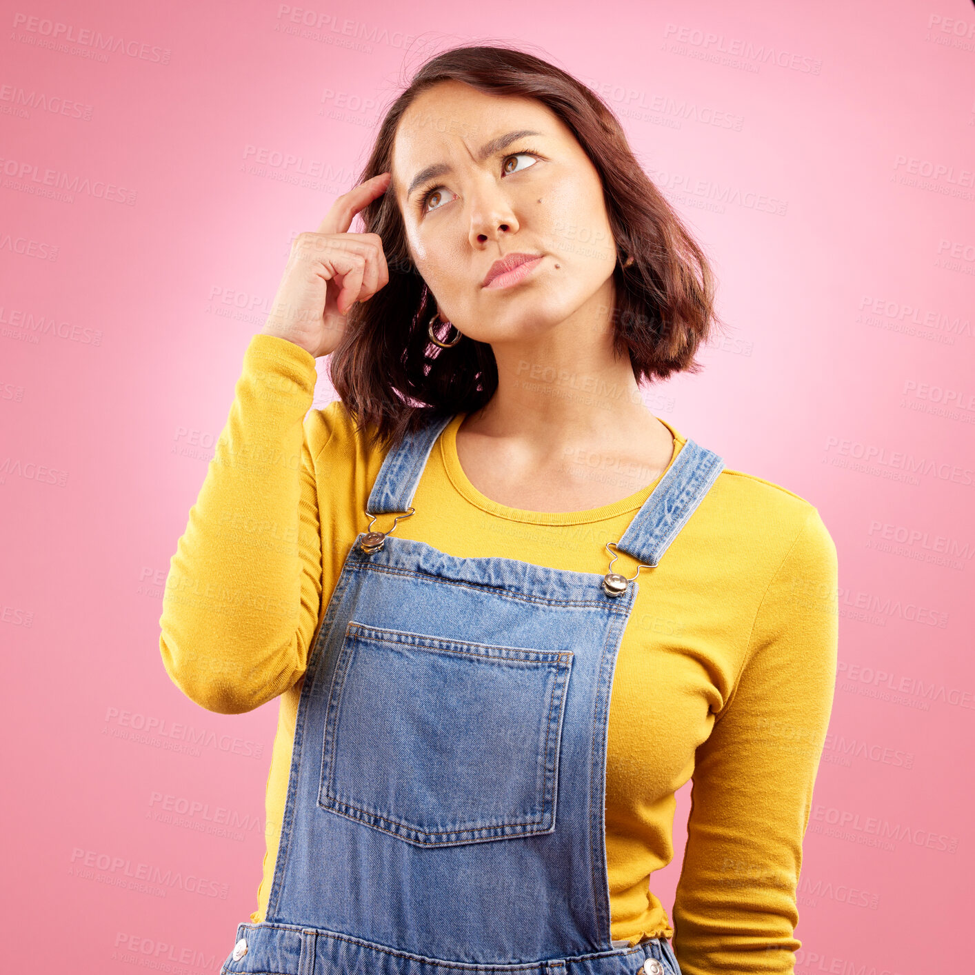 Buy stock photo Confused woman, thinking and scratch for ideas in studio, pink background and emoji for doubt, why and problem solving. Asian model daydream of decision, remember memory and brainstorming questions